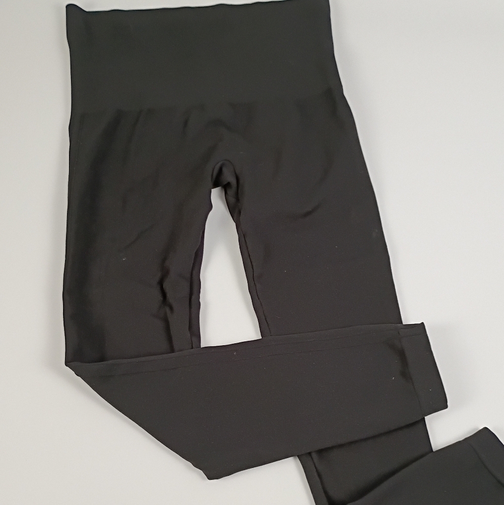 SPANX woman’s black leggings Medium